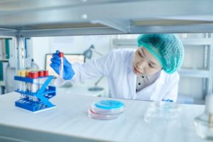 woman-working-with-test-tubes-2022-02-02-04-50-20-utc